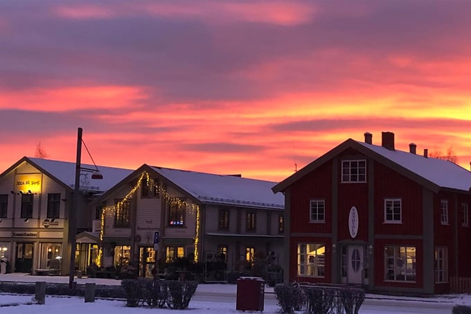 Woman and girl ice bathing in the evening